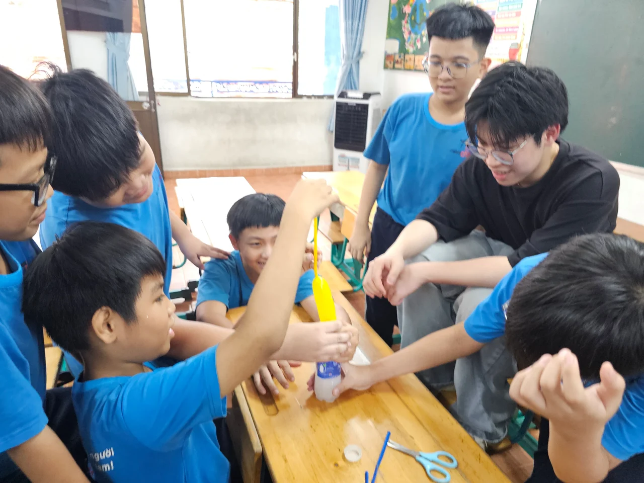 Students exploring a science experiment